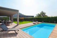 Swimming Pool mit Holzterrasse Schneider Pool &amp; Garten GmbH
